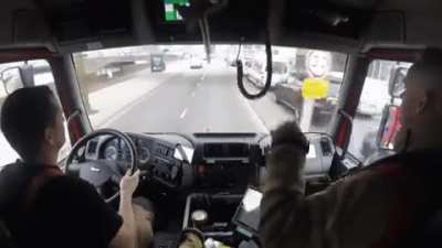Firefighters rushing to a scene