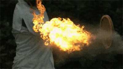 Hitting a burning tennis ball in slow motion