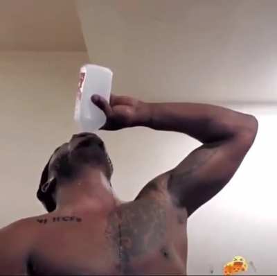 Man chugging a bottle of rubbing alcohol on Facebook Live
