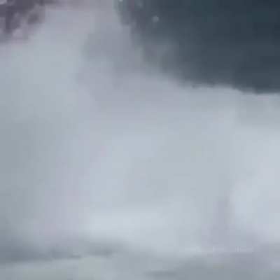 Driving straight into a breaking wave that overturns the boat