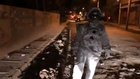 Artist Badaal Nanjudaswamy recreates an astronaut walking on moon full or craters in Bengaluru