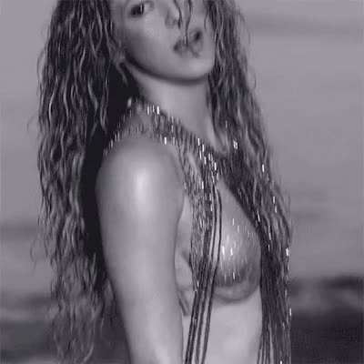 Shakira checking out her own ass