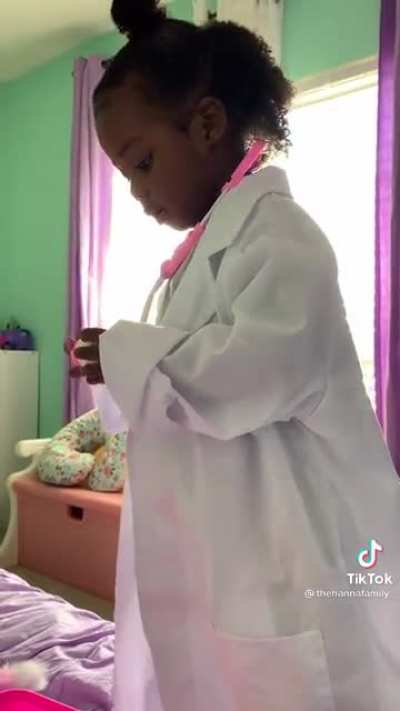 This little girl taking care of her sick mama