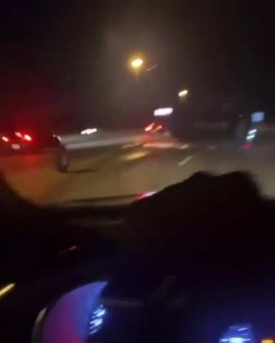 Car hits runaway tire on highway