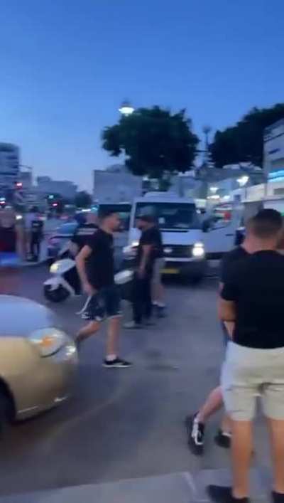 Israeli citizens arming up last night to go raid palestinian houses