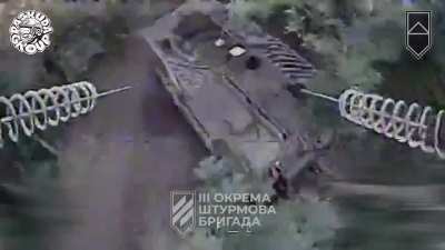 An FPV pilot of the Ukrainian 3rd Assault Brigade attacks one of the few remaining Russian 2S4 