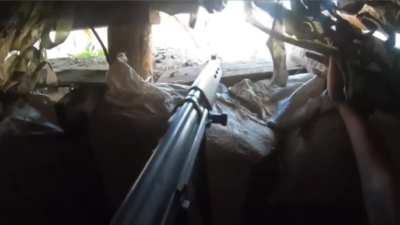 Brazilian Volunteer silences Russian using FN Fal.