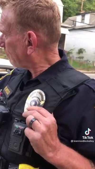Woman sees a black man surrounded by cops so she decides to record. The cops don’t like that.