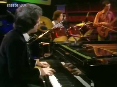 Billy Joel in 1975, performing 
