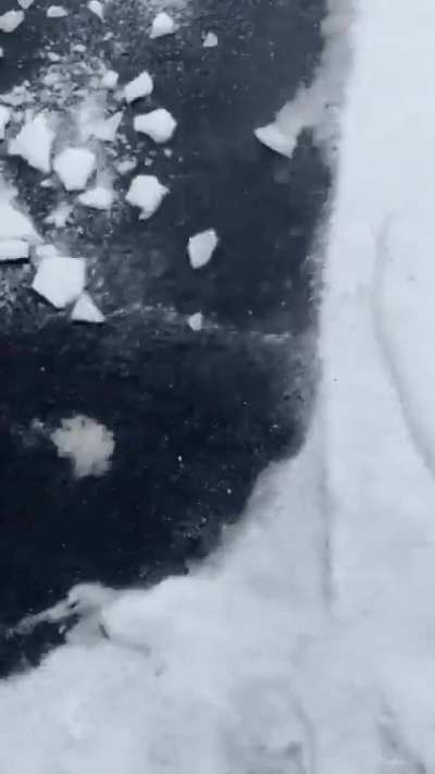 Try to take a video of me breaking a huge chunk of ice