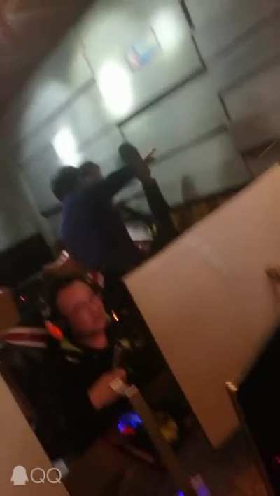 Chinese parents beat their child at internet cafe for not studying, said 