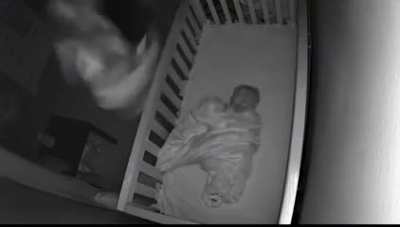 Mother sees an intruder on baby monitor