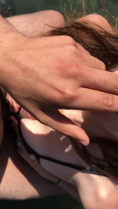 Titty fucking a hot brunette in a tide pool, sneaky