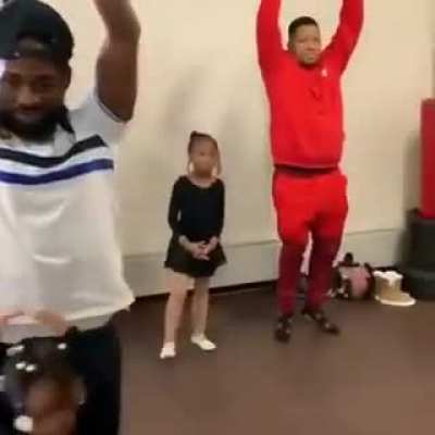 Dads dancing ballet with their daughters
