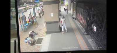 A woman walks to a bus stop. A window AC unit falls out of a window from the 17th floor. She never felt a thing.