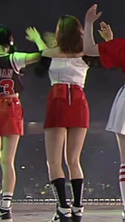 Mina - red shorts, white top, black knee-highs