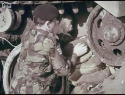 Chieftain crew using an explosive charge to remove a damaged track