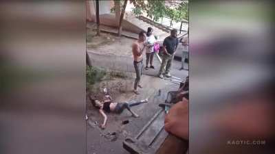 Man attempts to catch women pushed from balcony using a backpack...