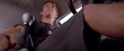 I rewatched 2f2f and noticed that Paul Walker pulls an invisible handbrake in this scene