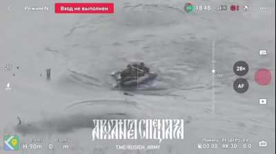 Ukranians crossing river under fire