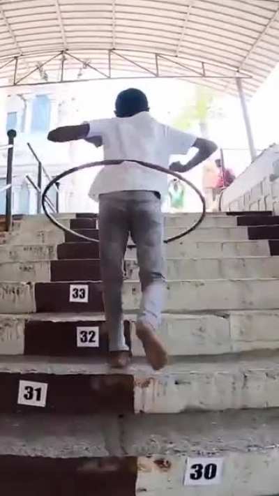 Aadhav Sugumar break the Guinness World Records for being the Fastest person to climb 50 steps while hula hooping in 18.28 seconds.