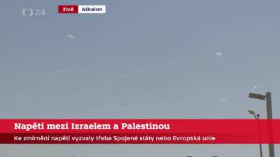 During a live interview there was sudden missile attack. Camera man managed to record missile defense in action