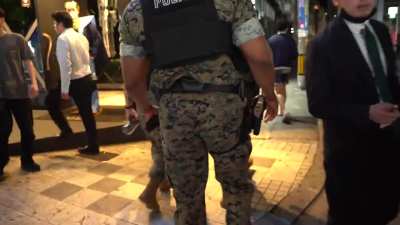 US military police have suspended solo patrols in Okinawa after they wrongly body-slammed and detained an American civilian who was visiting, and not under their jurisdiction.