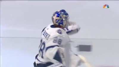 Andrei Vasilevskiy looks for teammates to celebrate with after the win.