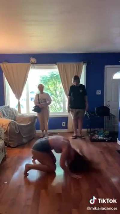 In front of her parents