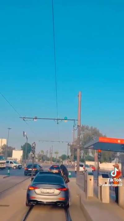 Family in Casablanca celebrate their wedding by driving on tramway track