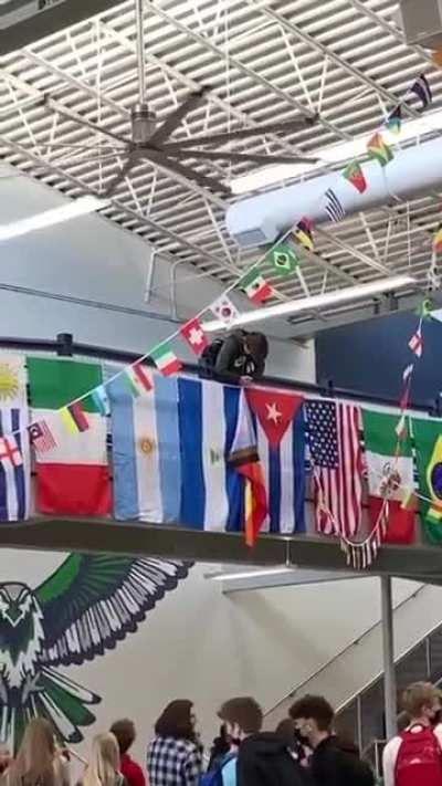 Man cuts off pride flag