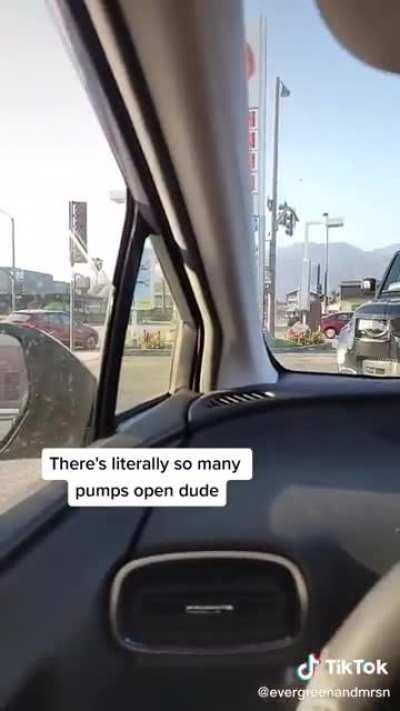 Range Rover driver is very particular about which gas pump she will use