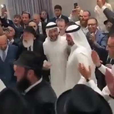 Arabs and Jews dancing together at a Jewish wedding in the UAE