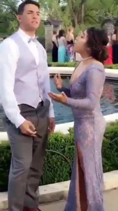Taking a selfie with his short girlfriend
