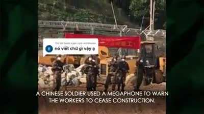Chinese soldiers throwing rocks at Vietnamese workers classy