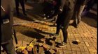 Protestors in Hong Kong using huge slingshot to shoot bricks at police dorm
