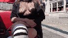 Breasts out while getting a tour of the city