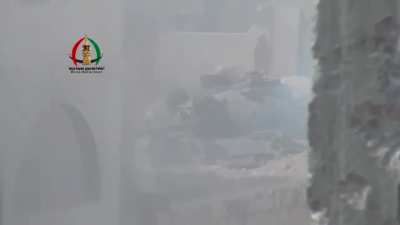 Opposition cameraman is engaged & wounded by a third party while filming a Syrian Army tank - Daraa - 2014