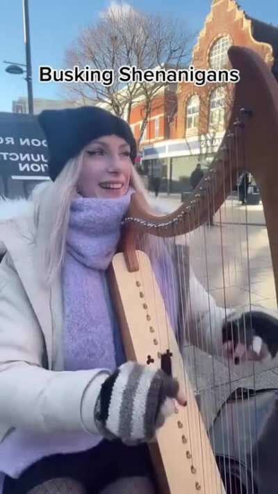 Karen against a performer