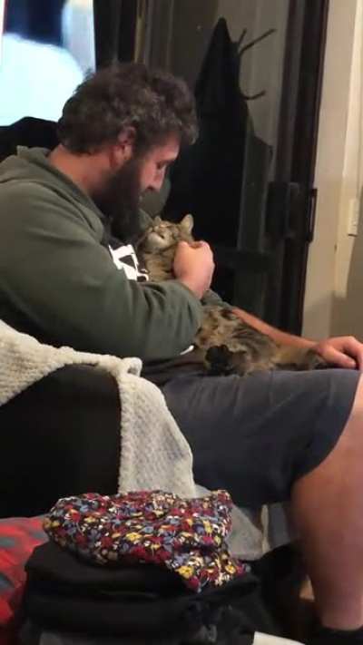 My partner didn’t want to get a cat, then a stray adopted us. He fell in love pretty quick.