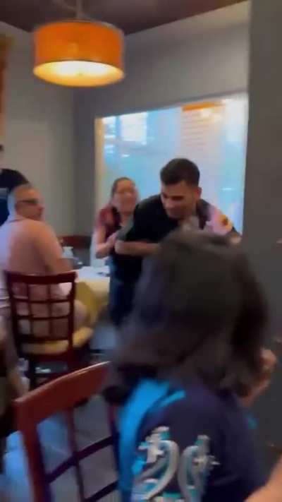 Dude gets lit up while watching meat. 