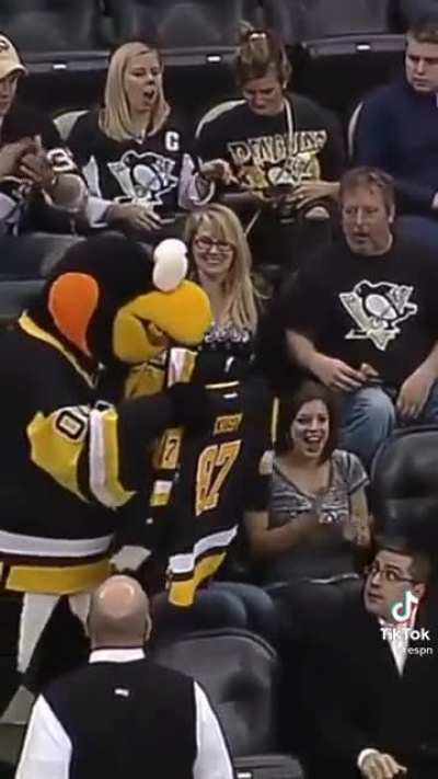 Somebody stealing puck from a kid