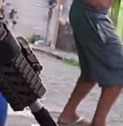 Ridiculous thug points gun at their friend