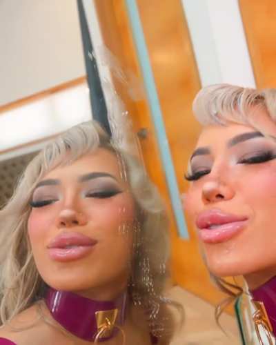 Luna Luxe paying with her spit