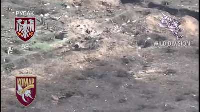 A Russian soldier catches a Ukrainian drone with his bare hands