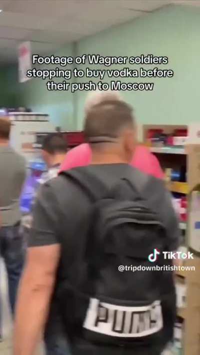 Wagner soldiers purchasing some vodka before their final push onto Moscow