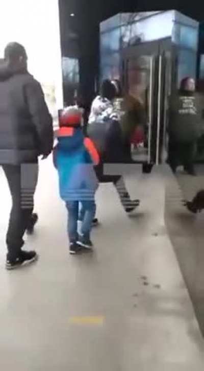 Russian handcuffed himself to the entrance of McDonald's and addresses Western countries... tells them they need to realize that the sanctions affect the lives of ordinary people. 
