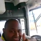 Bus driver posing for the camera