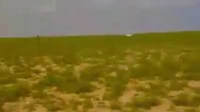 Iraqi tribesmen chase and destroy IS vehicle in Anbar desert. 2022.