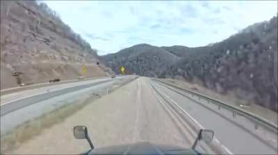 Truck Brakes Fail.  Takes run-away ramp at 90 miles per hour